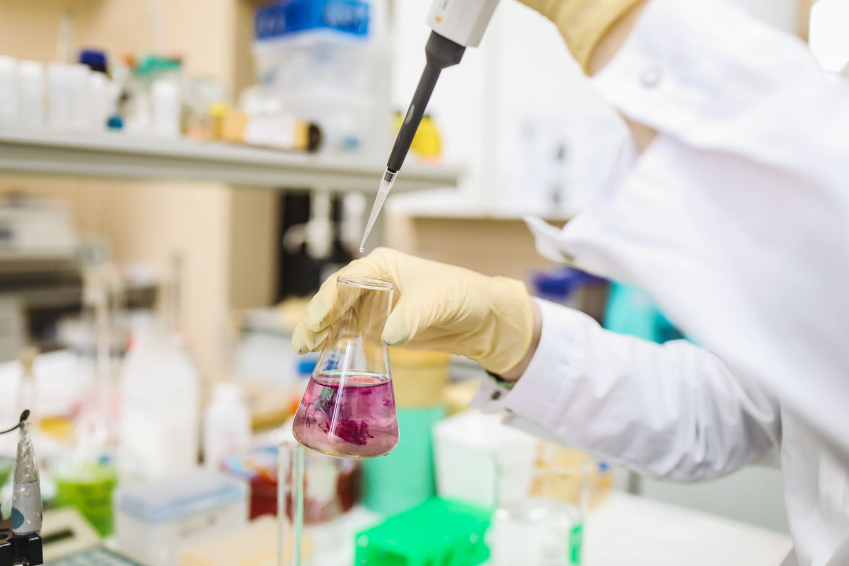 Stock photo: laboratory pipette — Polina Tankilevitch / Pexels. Illustrative laboratory, not Aurora or Eurofins.